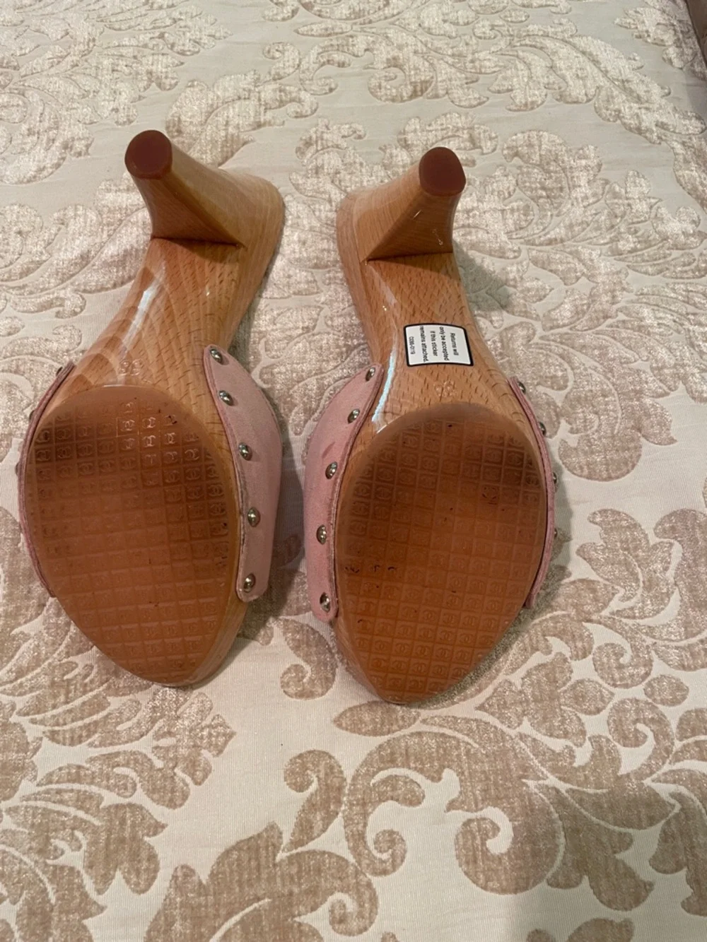 CHANEL Pink Leather Slide Mules with Silver CC Plaques. They are suede. Great